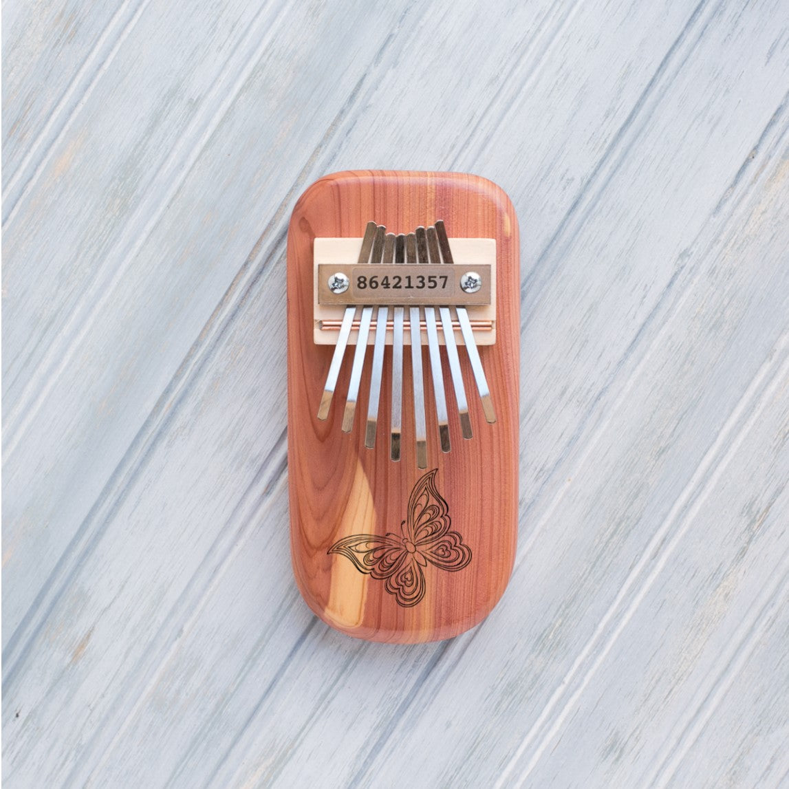 Butterfly Engraved Thumb Piano