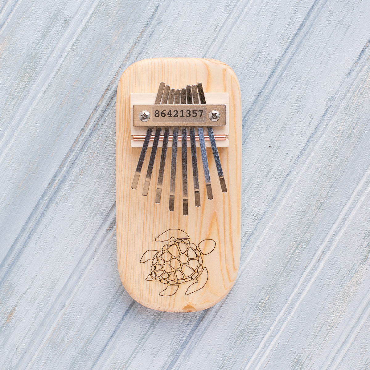 Turtle Engraved Thumb Piano