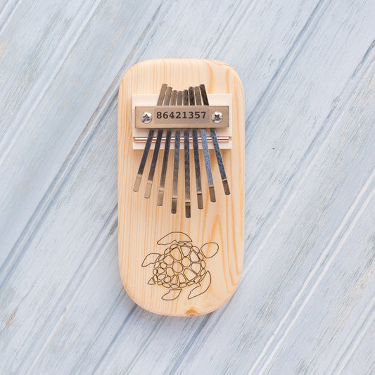 Turtle Engraved Thumb Piano